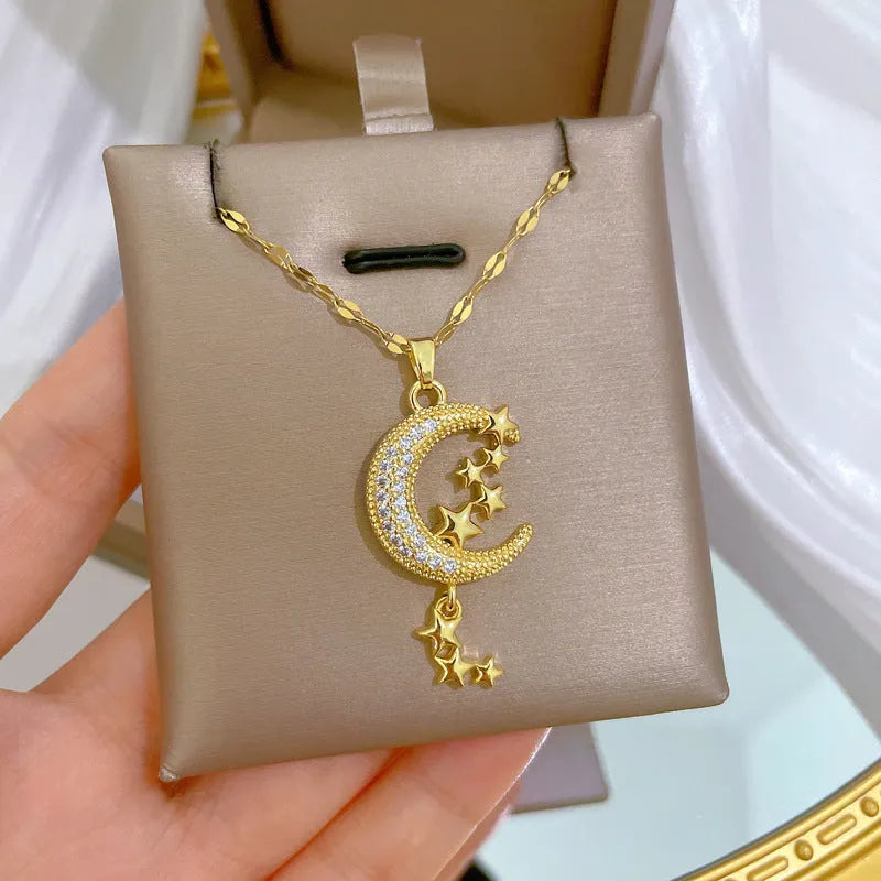 Moon pendant necklace with tassel details on stainless steel chain