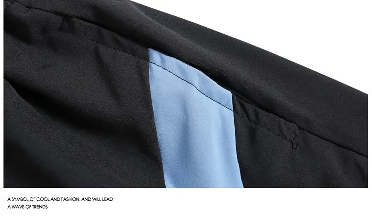 Men's black quick-drying training shorts with elastic waistband and above-knee length