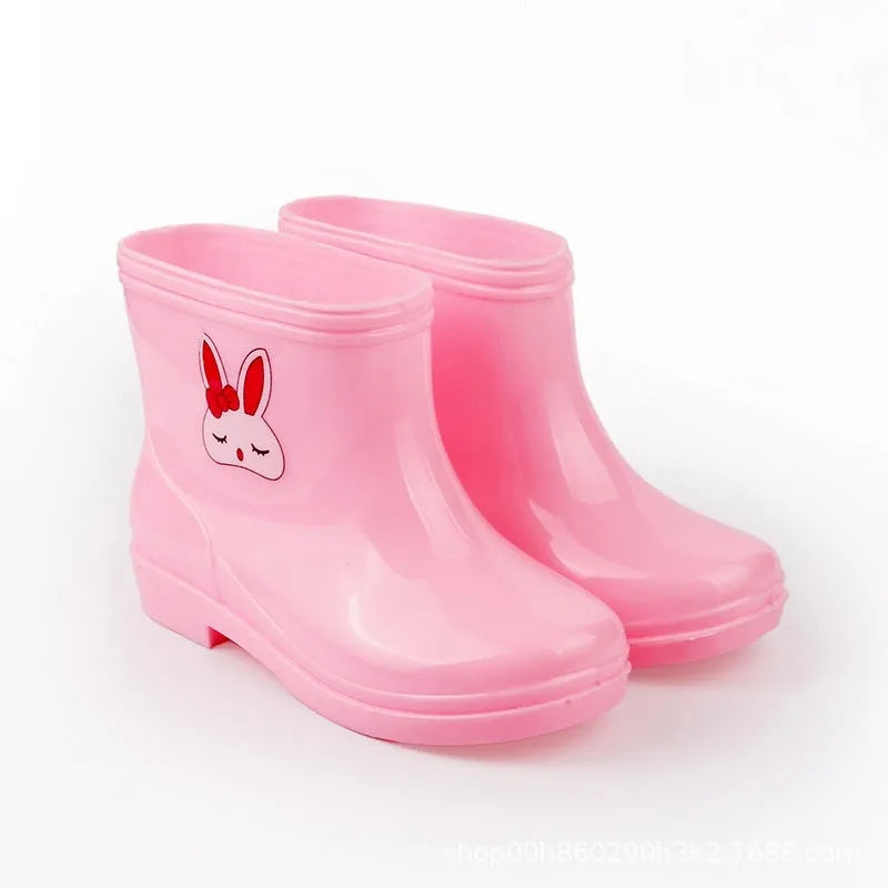 Children's non-slip plastic rain boots in solid colour with mid-calf height, available in multiple sizes