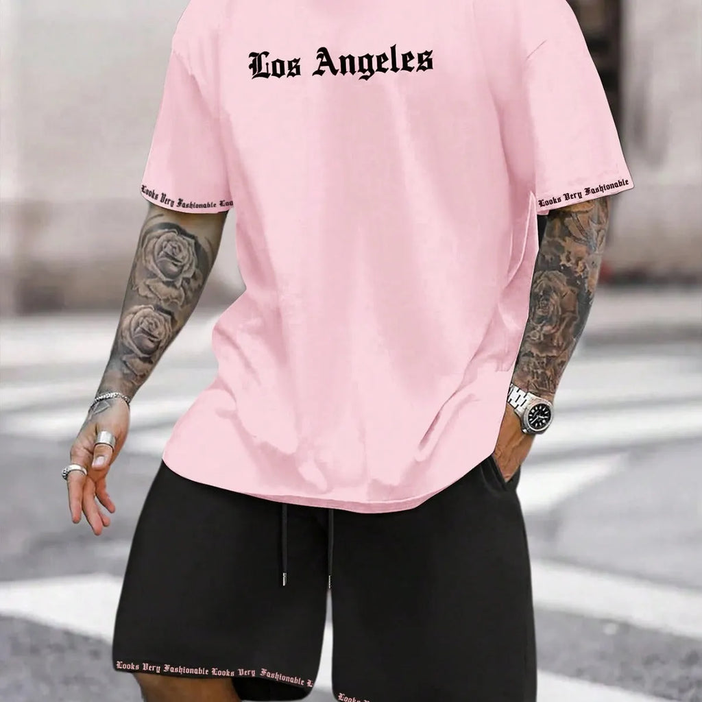 Sports style short-sleeved shirt and matching shorts set in a thin, printed fabric on a mannequin.