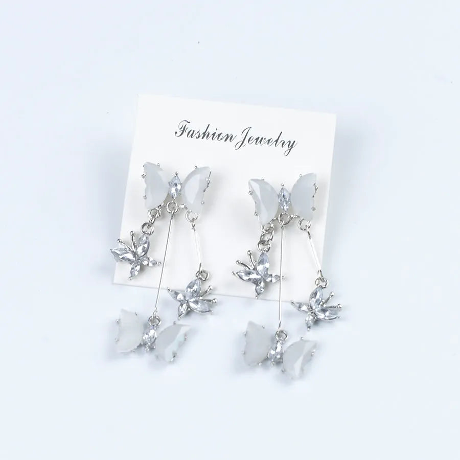 Butterfly fringe earrings in alloy and glass with electroplated finish, 1.8 x 5.3cm, light luxury style