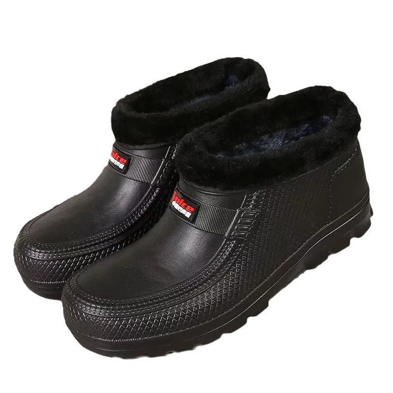 Unisex waterproof fleece-lined rain boots with anti-slip EVA sole in black, side view