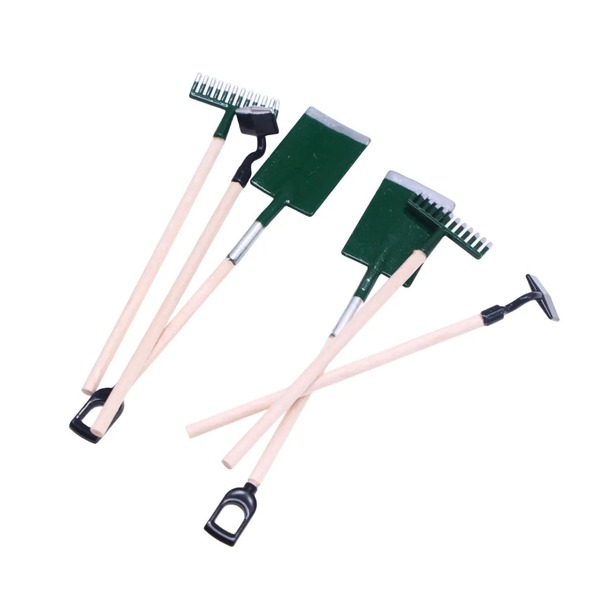 Three miniature alloy gardening tools set for dollhouse or elf garden scenes on white background