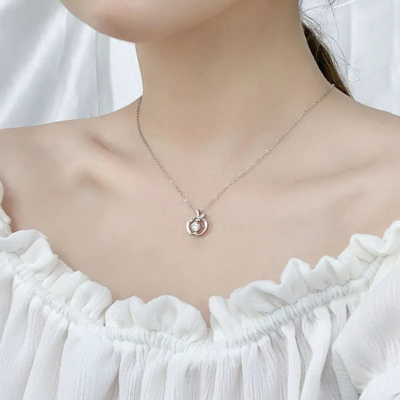Pure silver collarbone moissanite pendant Style1 on display, featuring a claw-set gemstone and 925 sterling silver chain