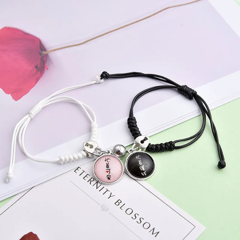 Alloy magnetic suction bracelet pair for couples with symbolic design options