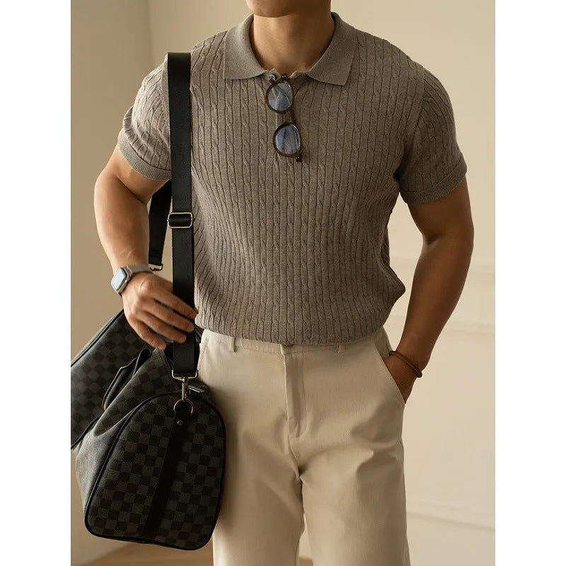 Men's khaki short-sleeve business top on a hanger, showing button placket and tailored fit.