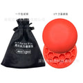 Orange golf training mat with centre of gravity zone for swing strength practice