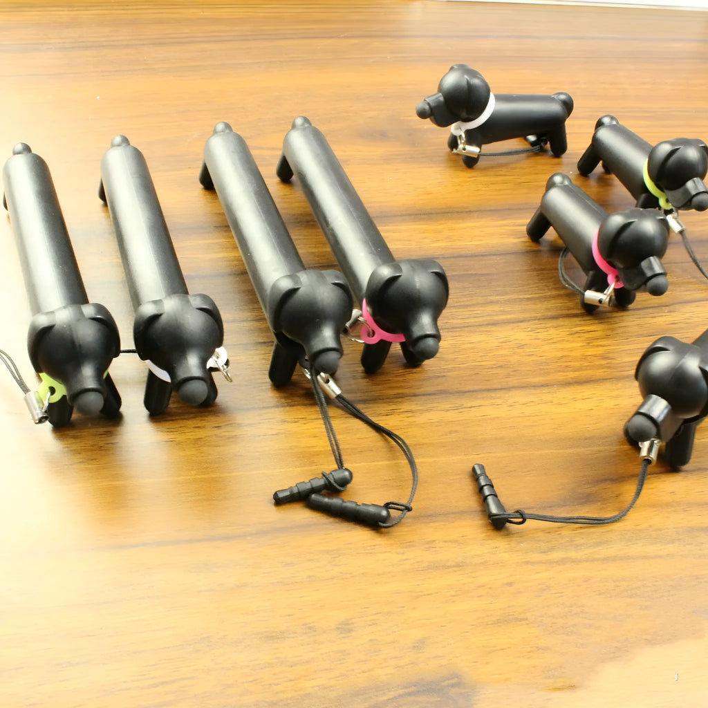 Black dog-shaped touch screen stylus with conductive body and phone holder function