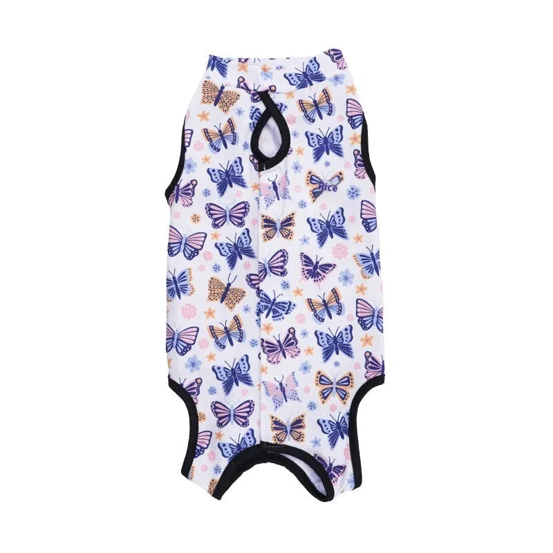 Cat wearing post-operative sterilisation recovery suit with velcro fastenings and printed design