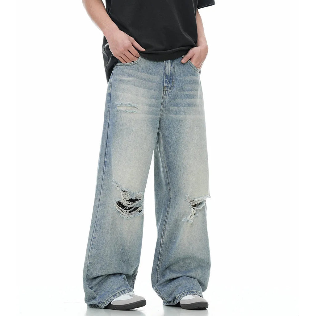 Blue men's straight-leg jeans with a distressed retro finish and a zipper fly.