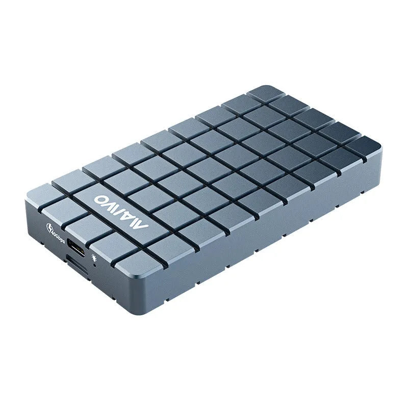 Silver aluminium USB4 hard drive enclosure for M.2 NVMe SSDs on a desk.
