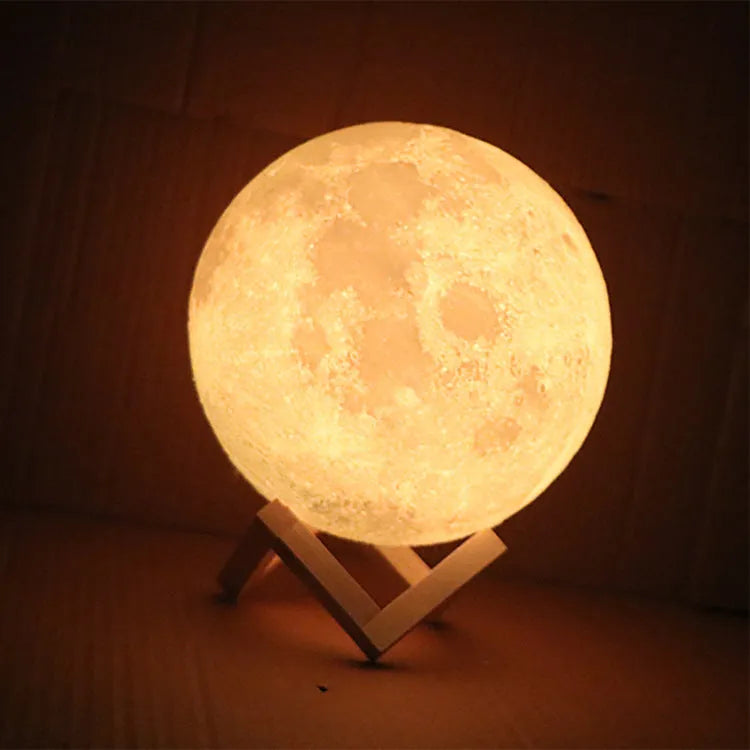 16-colour night light in 8 sizes from 8cm to 22cm on a bedside table
