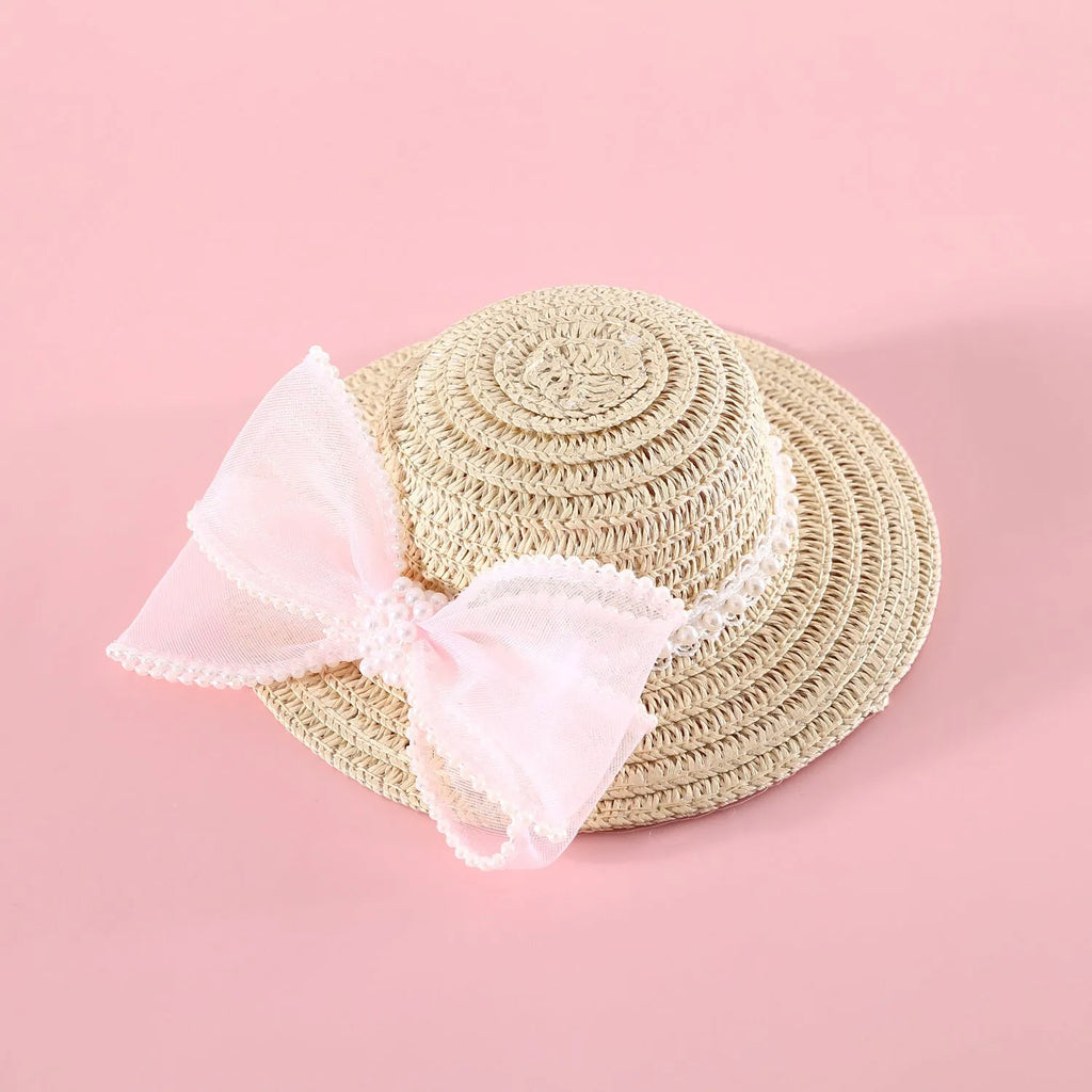 Woven Lafite leaf cat hat with pearl butterfly bow on a pink background, showing S and M size options.