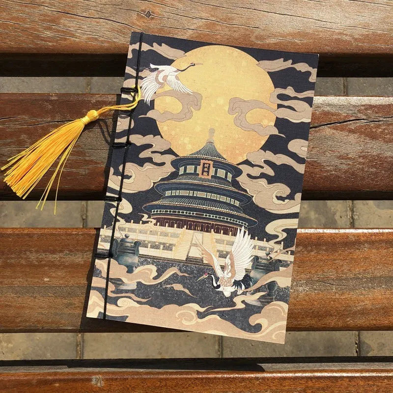 A5 antique thread-bound notebook with embossed cover and decorative tassels