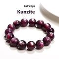 Close-up of a handcrafted purple lepidolite crystal bracelet with polished round beads on a wrist.