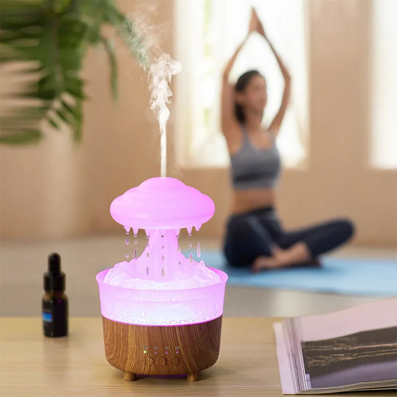 Wood grain white cloud shaped humidifier and essential oil diffuser with coloured LED lights on