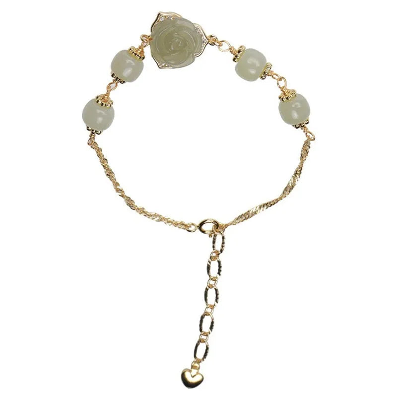 Original design women's bracelet in Hetian jade rose with 14K gilding and a flower shape.