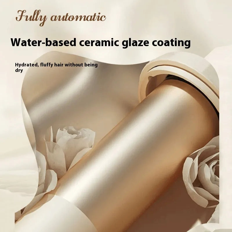 White brand automatic hair curler with 32mm barrel and choice of plug adapters