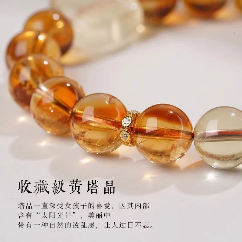 Women's carved citrine bracelet with geometric patterns on 10mm crystal beads in ethnic style