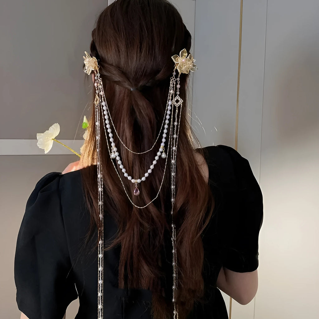 Gold grip hairpin with white pearl diamond flower and long clear tassel decoration.