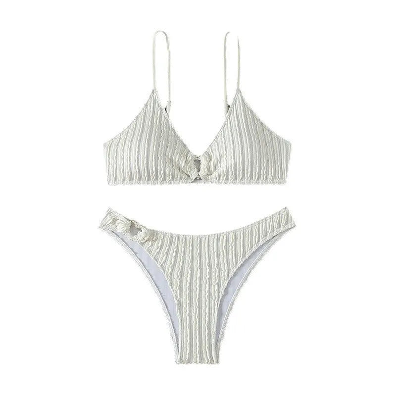 Women's white V-neck two-piece swimsuit set with sleeveless top and shorts on a mannequin.