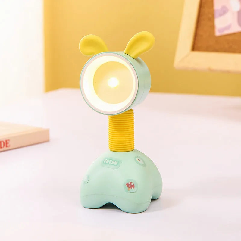DIY cartoon magnetic small night lamp in assorted animal styles and colours on a desktop.