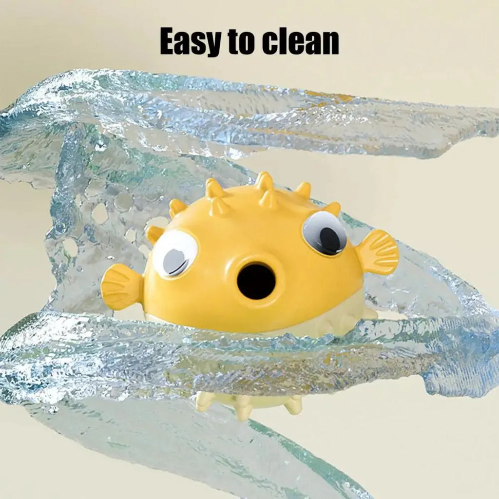 Yellow fish-shaped dog chew toy with textured surface and squeaker function