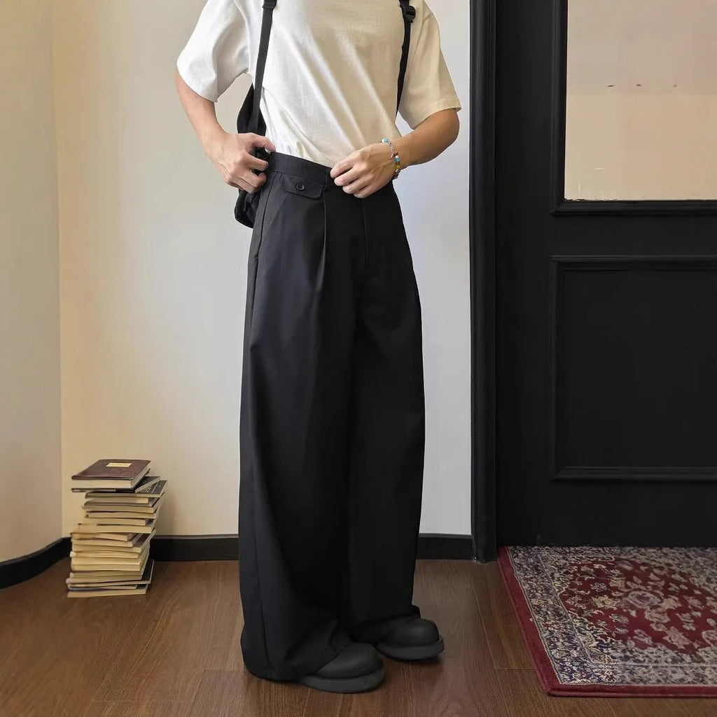 Men's straight-leg casual trousers with loose wide-leg cut and draping design in black or brown