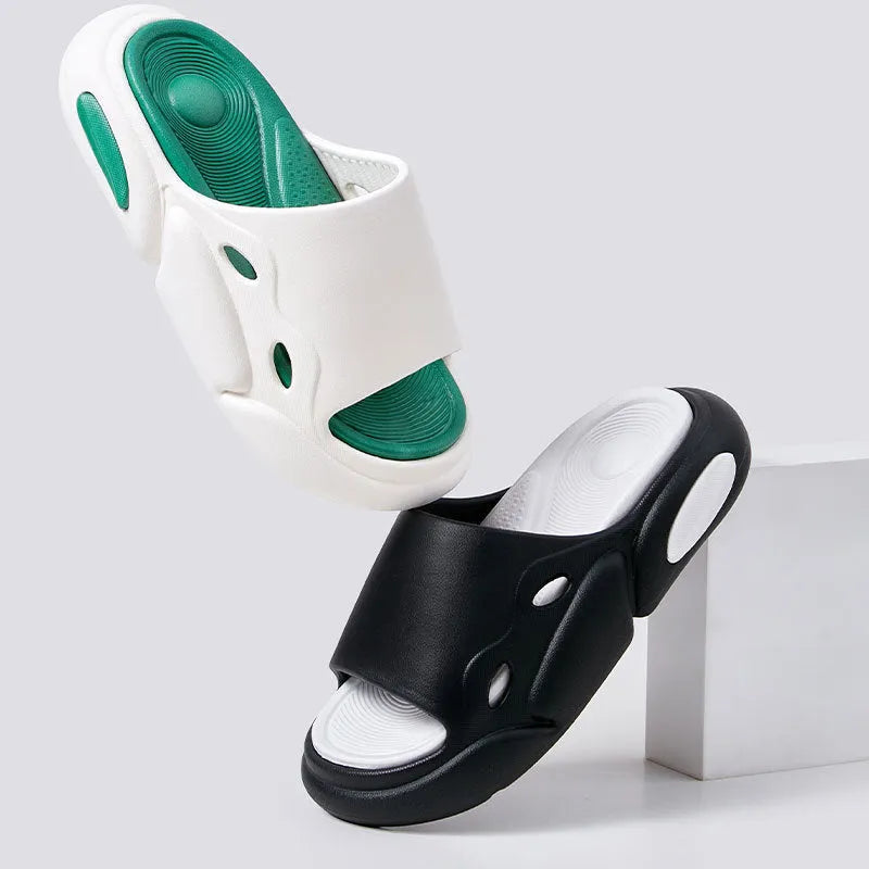 A pair of unisex EVA foam slippers with a thick sole and leather lining, shown in a two-colour design.