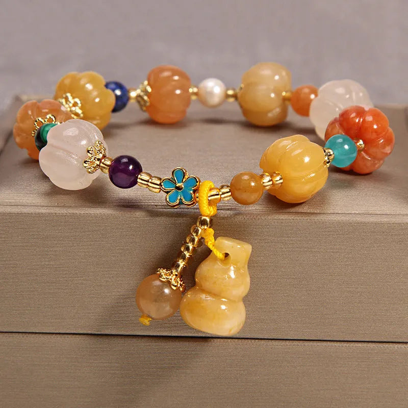 Women's yellow agate crystal bracelet with gold silk thread in khaki color