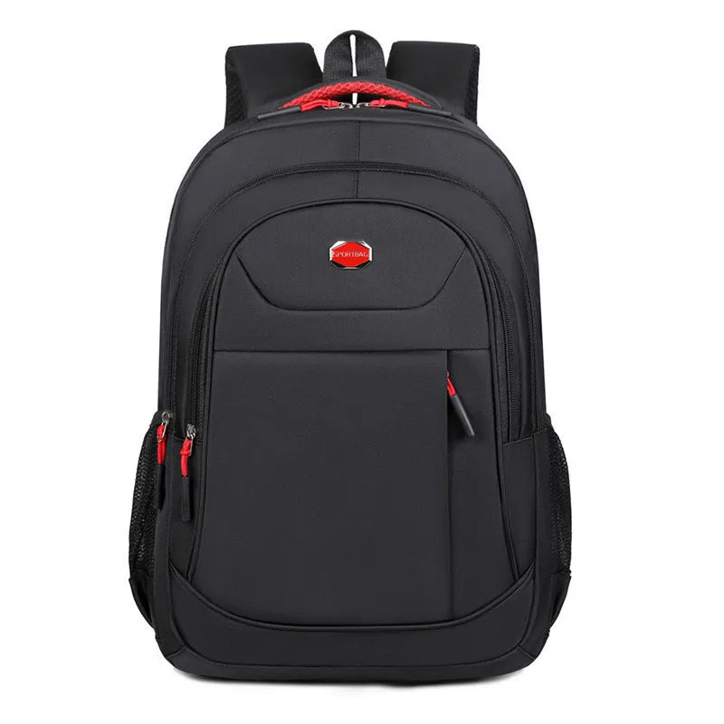 Solid colour Oxford cloth college backpack with curved shoulder straps, shown in black.