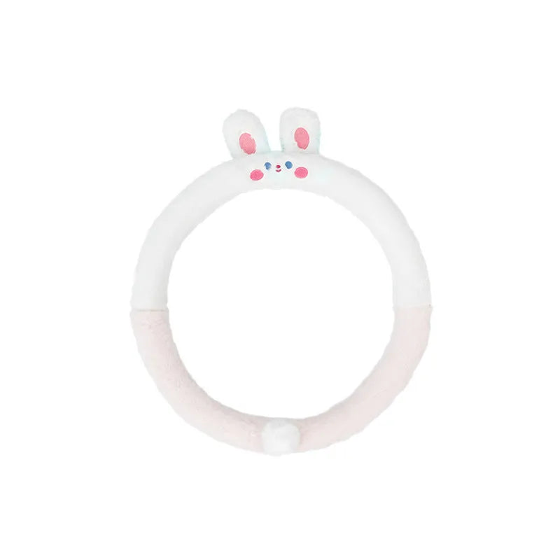 Plush rabbit fur steering wheel cover with embroidered cartoon design, shown fitted on a 38cm wheel.
