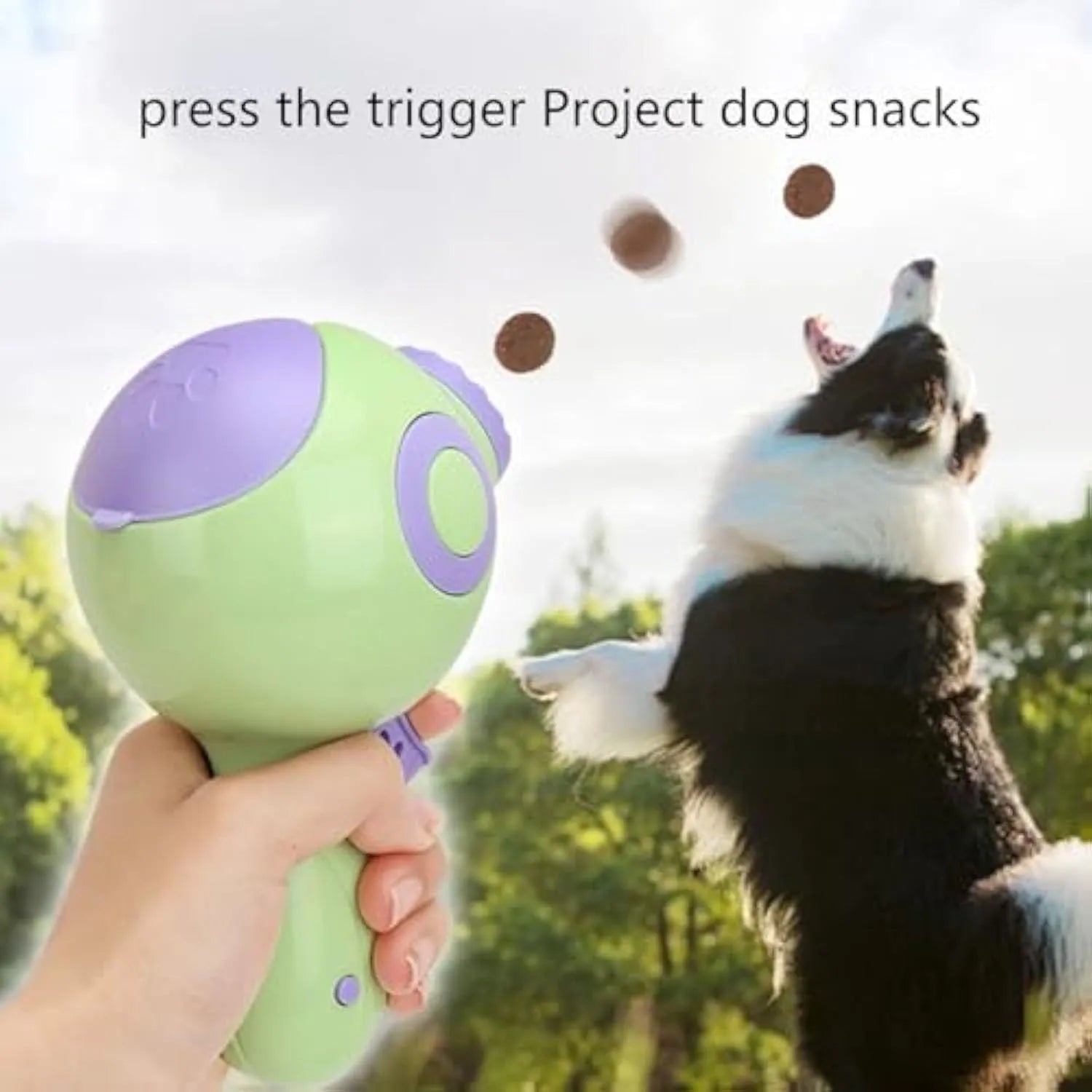 Green dog treat launcher toy measuring 15.5cm length with automatic food dispenser