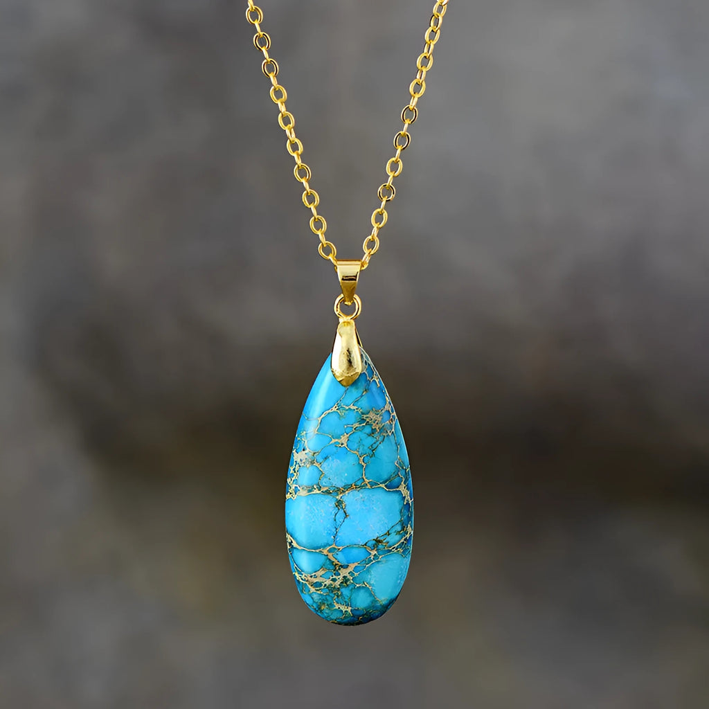 Emperor Stone jade pendant necklace with 18K gold plating, showing heart-shaped design in red silver finish.