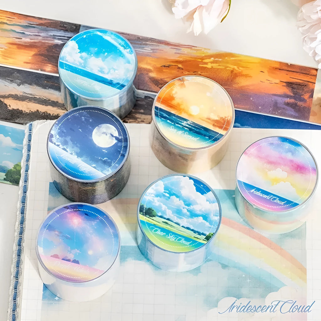 Roll of Japanese paper decorative tape with sky theme designs including clouds and nebula patterns