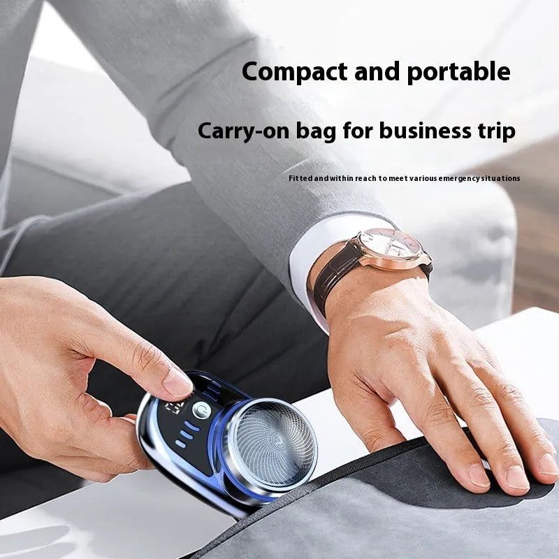 Mini electric shaver with LED digital display, black finish, and removable cutter head for travel use