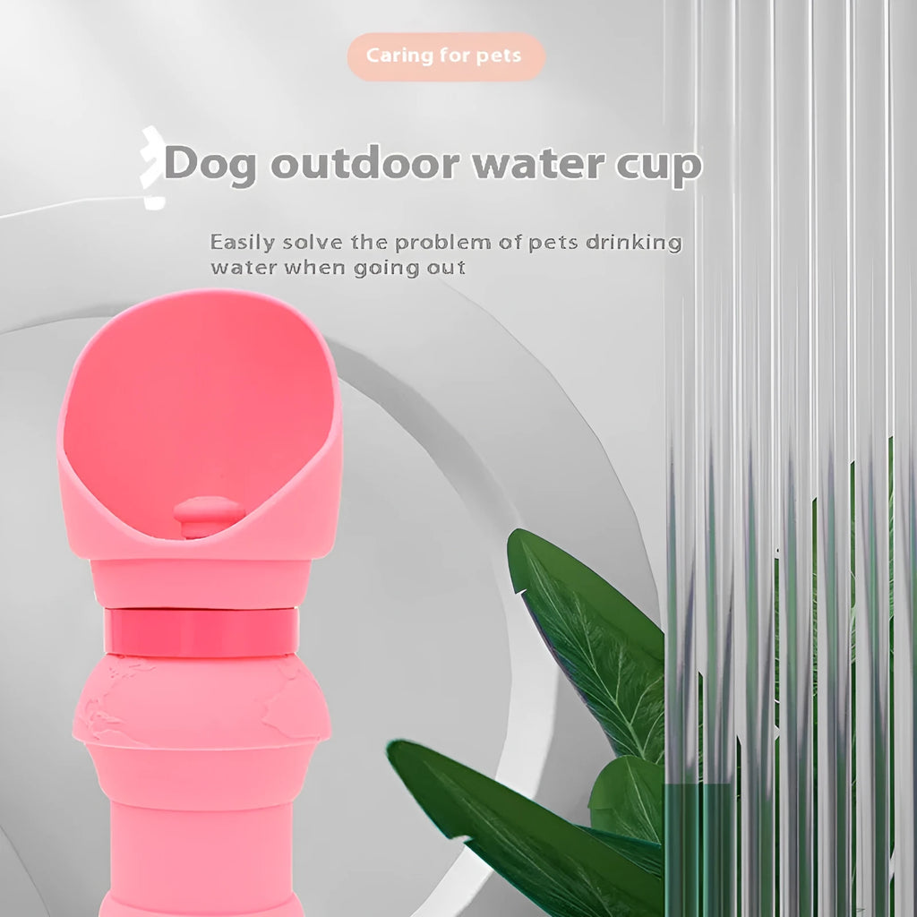 Silicone pet folding water cup shown in pink colour, unfolded ready to use.