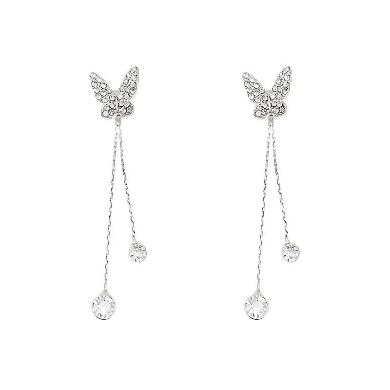 Silver alloy butterfly tassel earrings with geometric design, fresh style, on white background