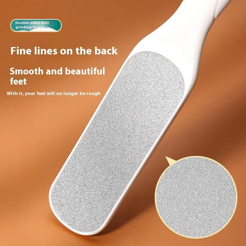 Double-sided stainless steel foot grinder with black and white abrasive pads for foot care