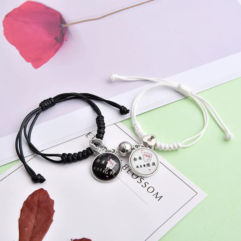 Alloy magnetic suction bracelet pair for couples with symbolic design options