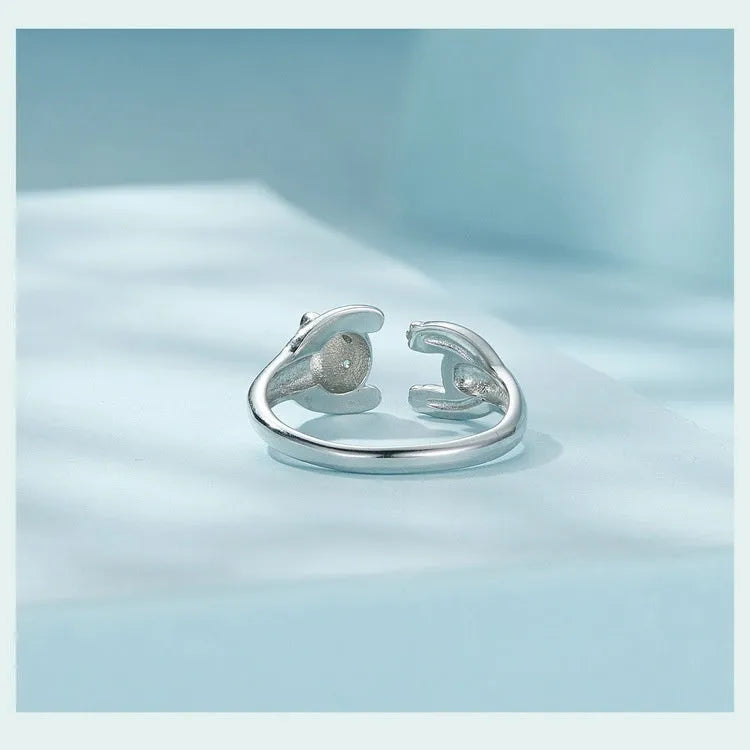Sterling silver adjustable panda ring with white gold plating showing open bracelet design