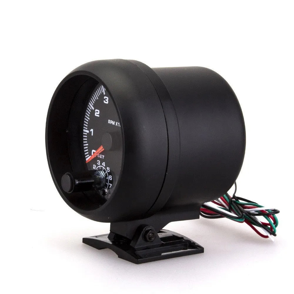 Blue light pointer automotive tachometer showing 0-8000 RPM range