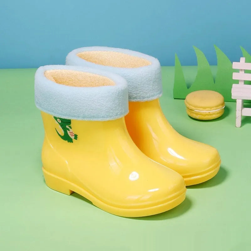 Children's non-slip plastic rain boots in solid colour with mid-calf height, available in multiple sizes