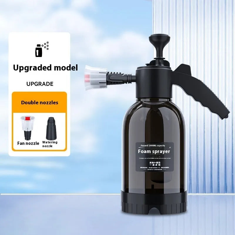 Black hand-held foam sprayer with 2L capacity, ergonomic handle, and switch lock for gardening and car washing.