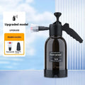 Black hand-held foam sprayer with 2L capacity, ergonomic handle, and switch lock for gardening and car washing.