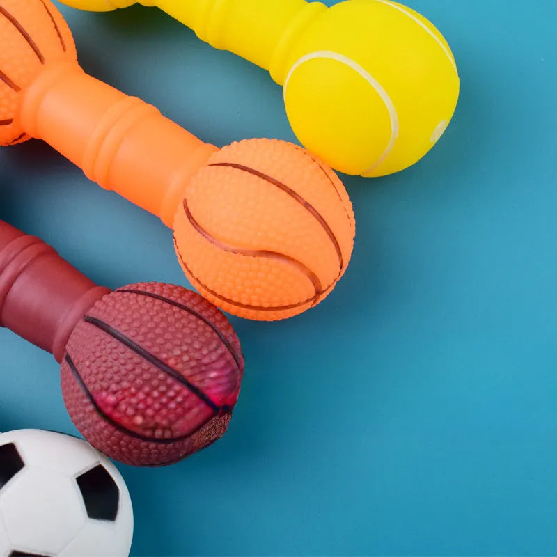 Brown, orange, white, and yellow PVC football dumbbell shaped squeaky dog chew toy