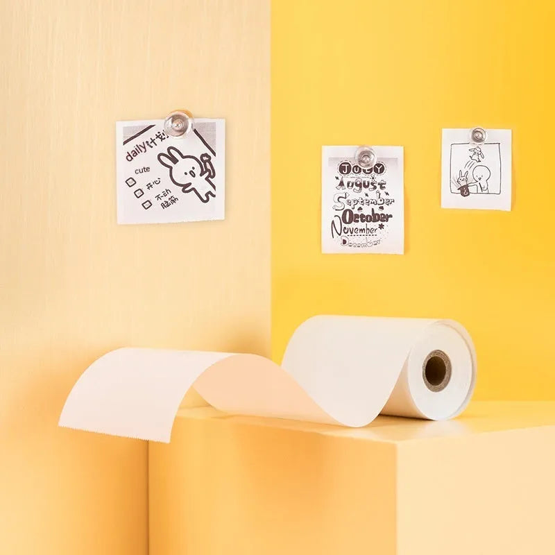 Three rolls of white 57mm by 30mm thermal paper for small printers.