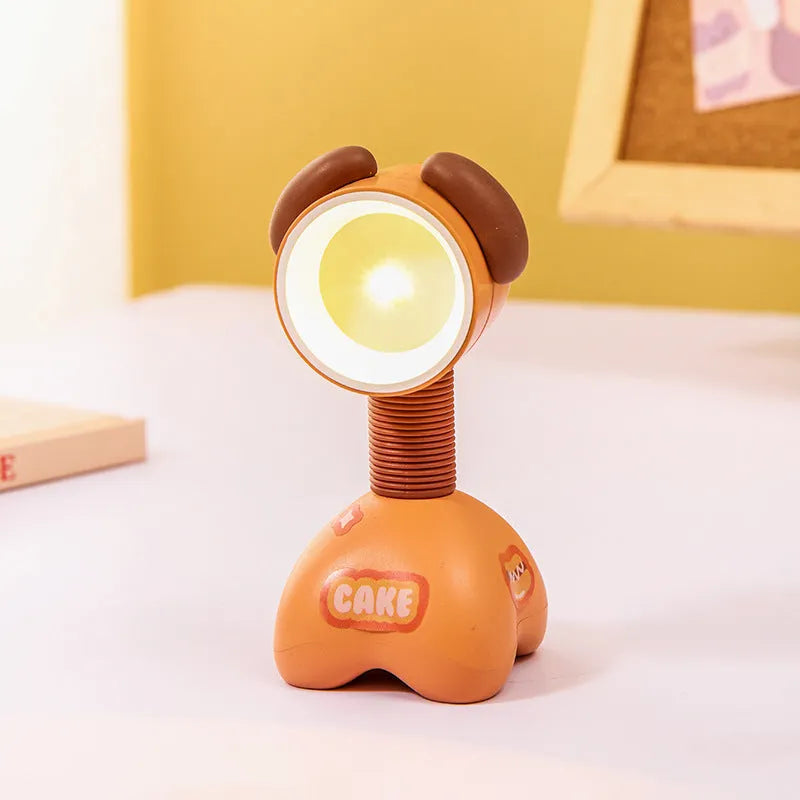 DIY cartoon magnetic small night lamp in assorted animal styles and colours on a desktop.