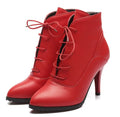 Women's lace-up Martin boots with stiletto heel in black, brown, and red