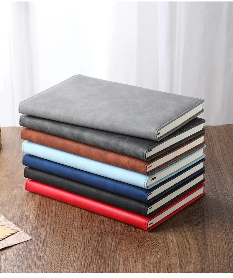 A5 notebook with PU leather cover in choice of colours including black, red, green, blue and orange.